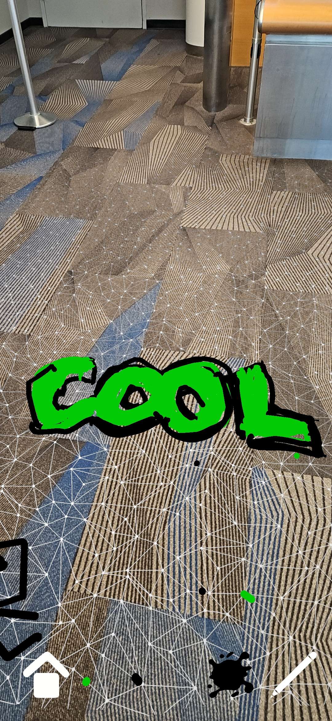 A green graffiti tag with black outlines, it reads: COOL